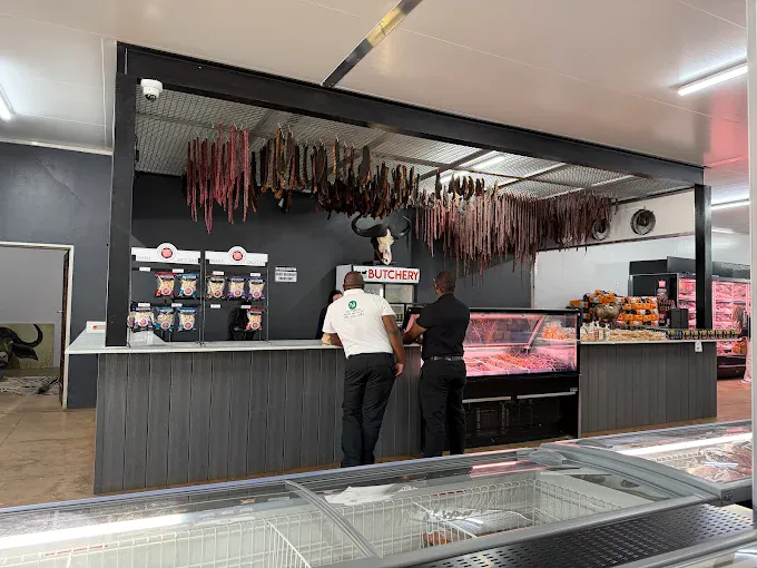 Danie Jooste Butchery Counter with hanging biltong and droewors
